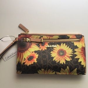 Calvin Klein clutch new with tags, never used!